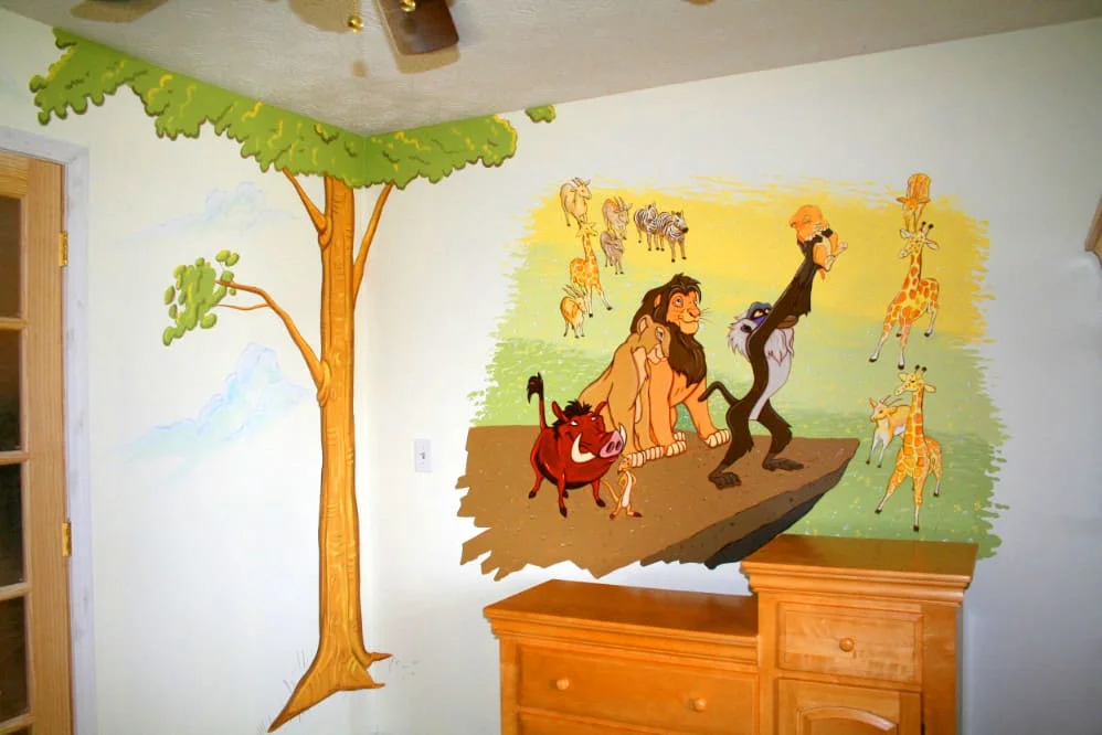 Kids' mural Atlanta: Whimsical forest scene with friendly animals.