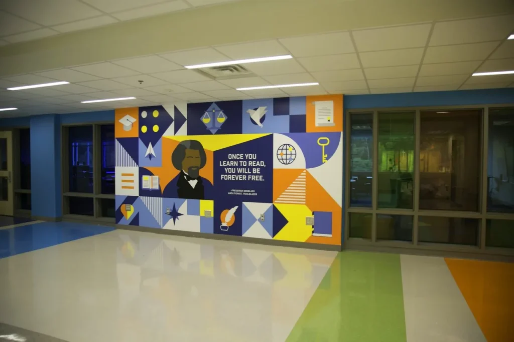 Hand-painted mural in Atlanta, GA. Geometric shapes and vibrant colors.