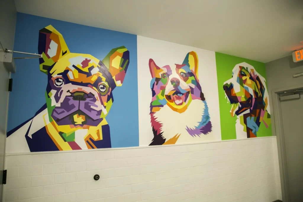 Restaurant mural in Atlanta: Colorful illustration with dogs.