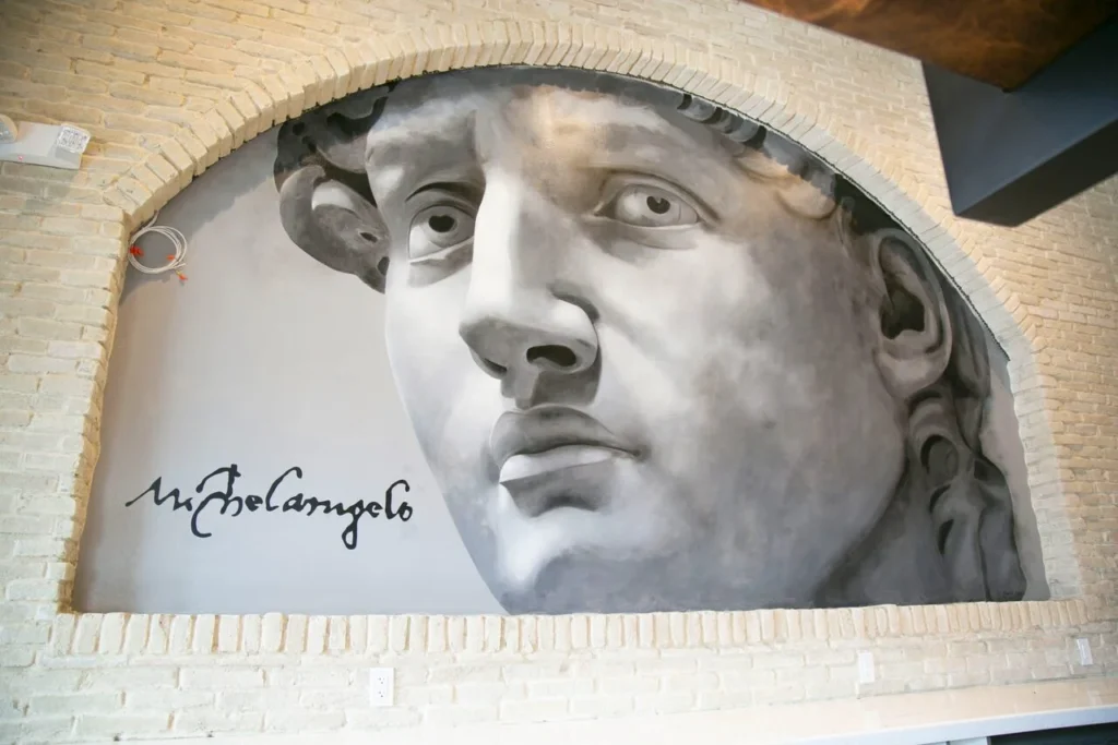 Hand-painted mural in Atlanta, GA. Realistic depiction of an object.