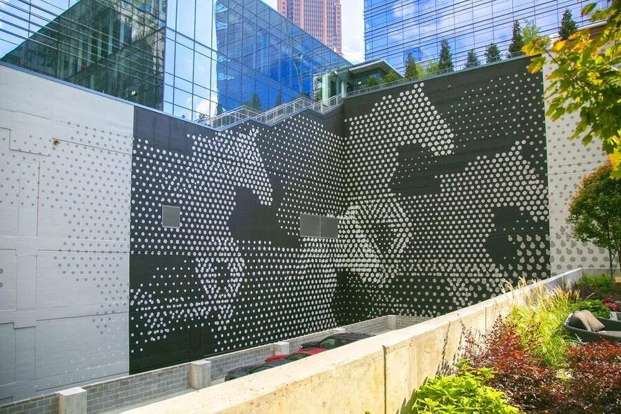 Hand-painted mural in Atlanta, GA. Pointillism style with abstract shapes.