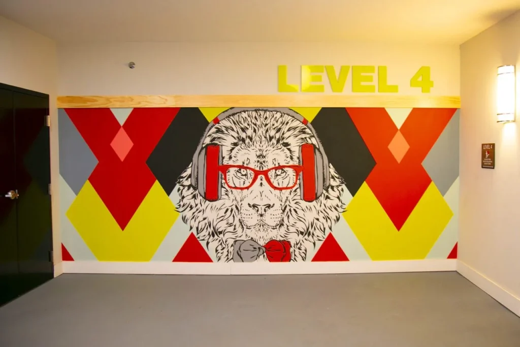 Atlanta mural services: Lions with a retro pop-art vibe.
