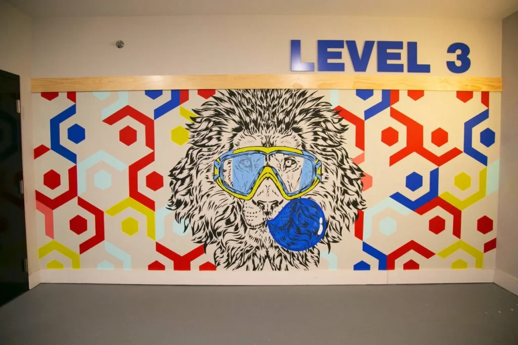 Atlanta mural: Lions in a pop-art vintage style.