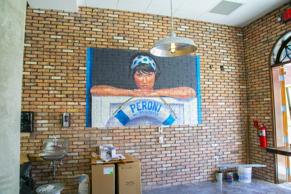 Hand-painted mural in Atlanta, GA. Realistic illustration with depth.