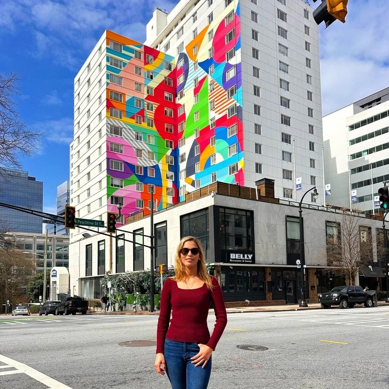 Upper Westside Atlanta" mural with a map of Atlanta neighborhoods.